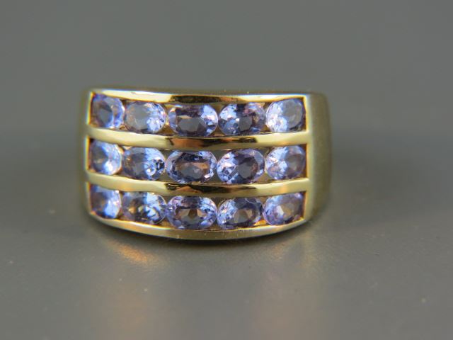 Appraisal: Tanzanite Ring oval gems totaly carat in triple row band