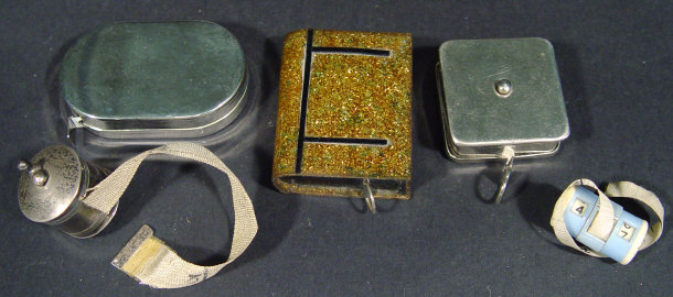 Appraisal: Collection of novelty sewing tape measures one silver metal barrel