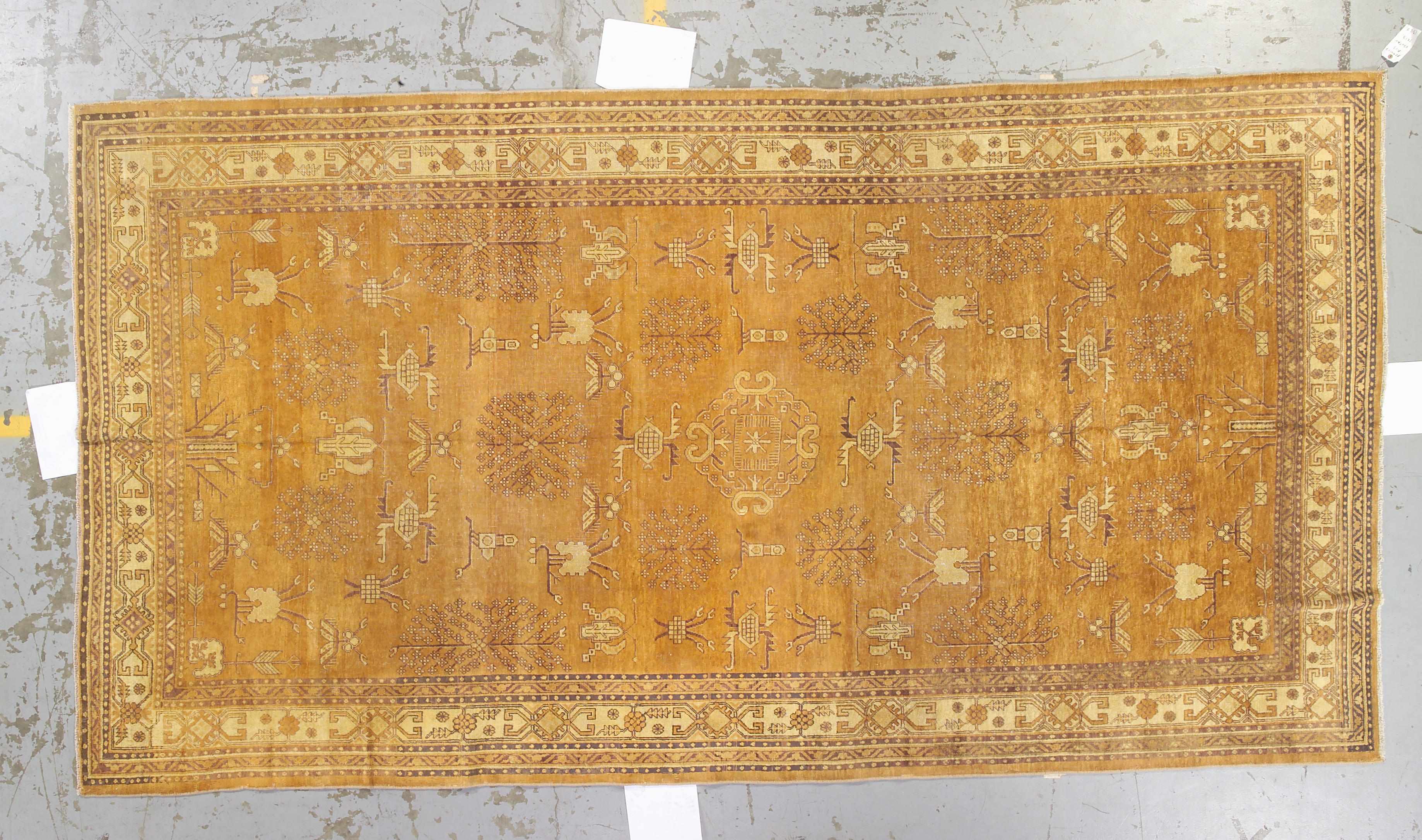 Appraisal: A Khotan carpet Turkestancirca size approximately ft x ft