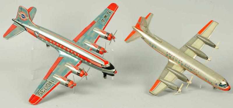 Appraisal: Lot of Tin Litho Airplane Toys Description Working Includes one