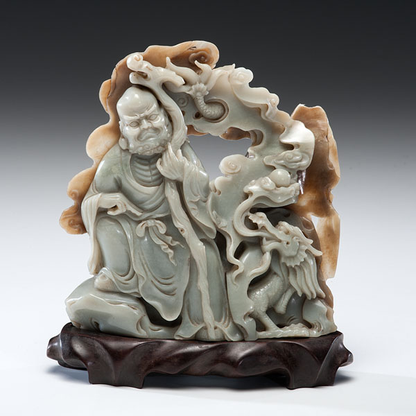 Appraisal: Chinese early th century A grey-green jade carving of an