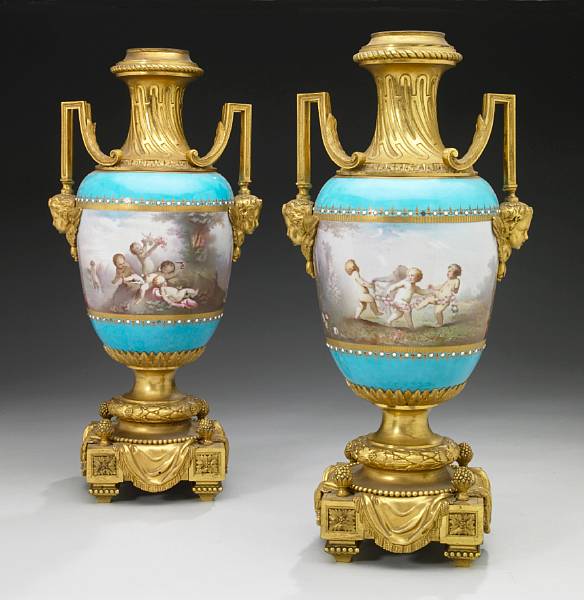 Appraisal: A pair of Napoleon III S vres style jeweled porcelain