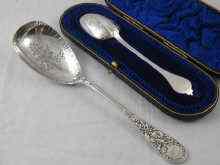 Appraisal: A silver lace back trefid spoon London in original box