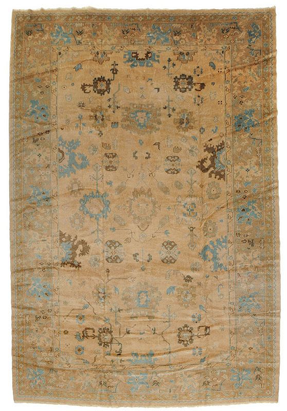 Appraisal: Oushak Carpet early mid th century repeating designs on tan