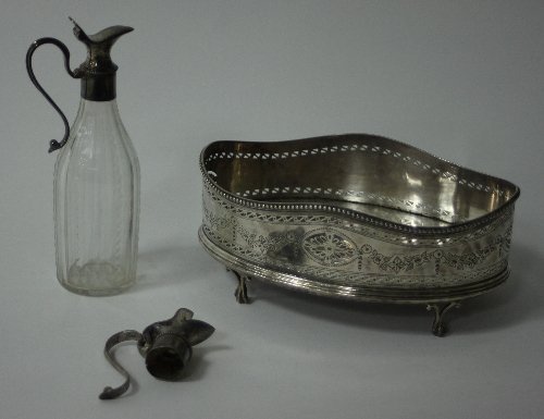 Appraisal: A George III silver cruet stand Robert Hennell London the