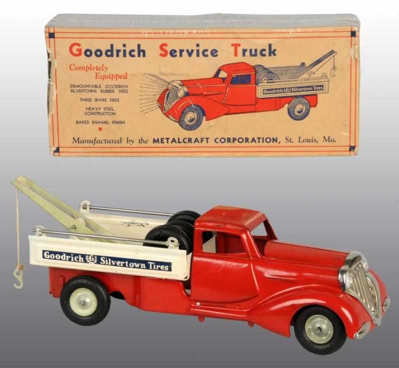 Appraisal: Pressed Steel Metalcraft Goodrich Truck Toy Description American Working All