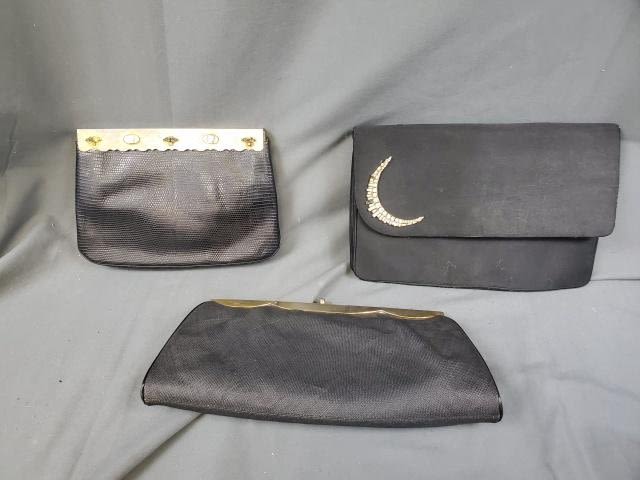 Appraisal: Black purse with frame with nice carved figural abalone embellishments