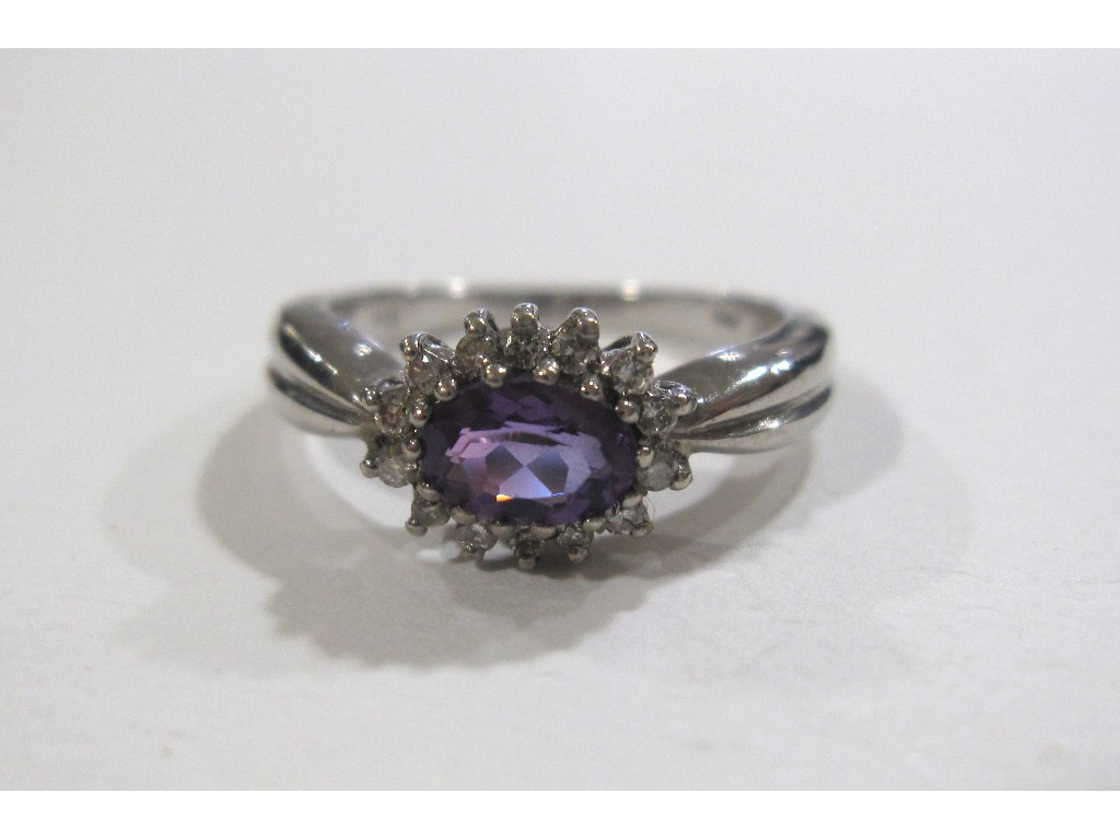 Appraisal: Nine carat white gold amethyst and diamond cluster ring