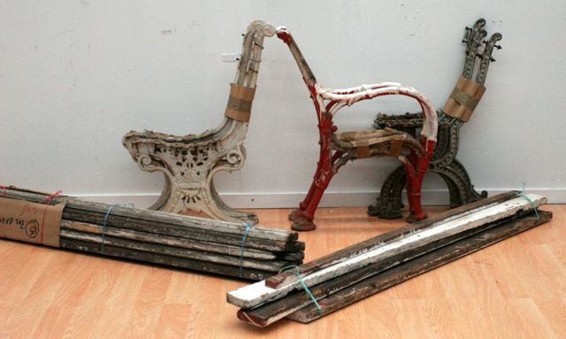 Appraisal: Three th century cast iron benches together with original wooden