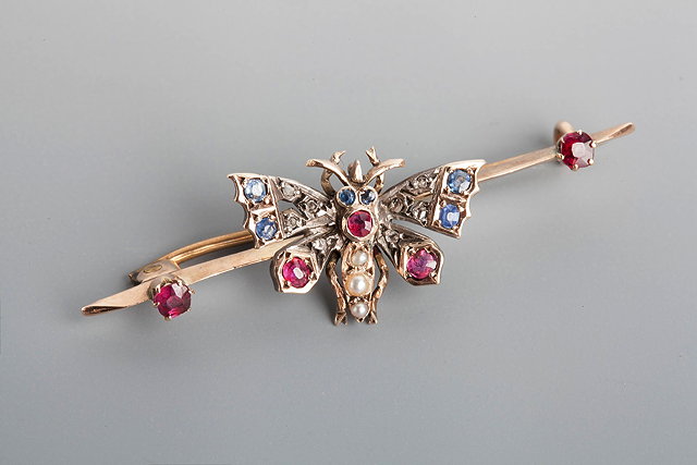 Appraisal: A SAPPHIRE RUBY PEARL AND DIAMOND SET BUG BROOCH in