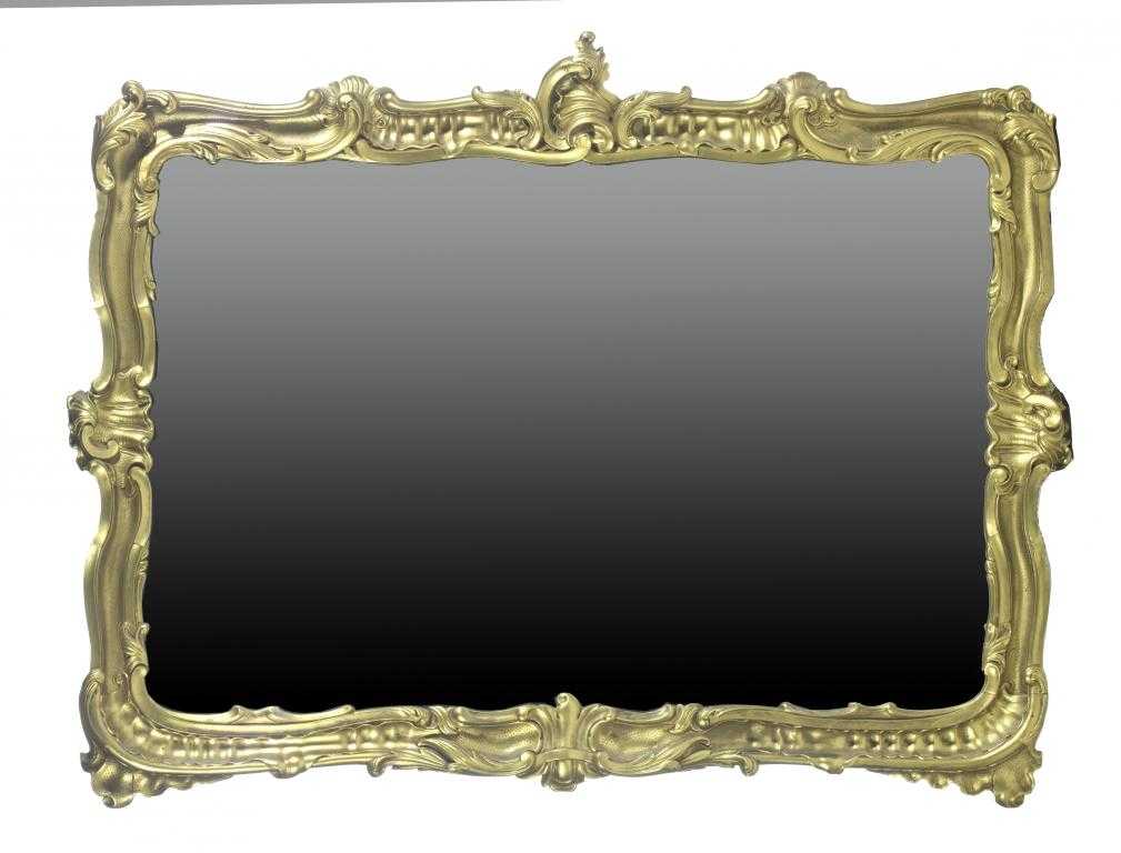 Appraisal: A VICTORIAN ROCOCO REVIVAL GILTWOOD MIRROR the unbevelled plate in