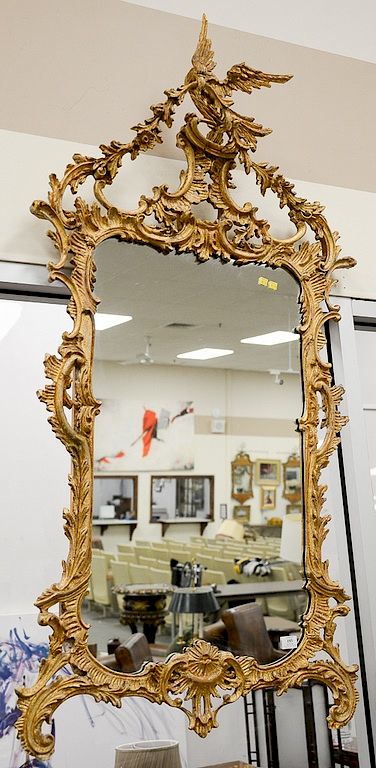 Appraisal: Carved Chippendale style mirror with phoenix bird top late th