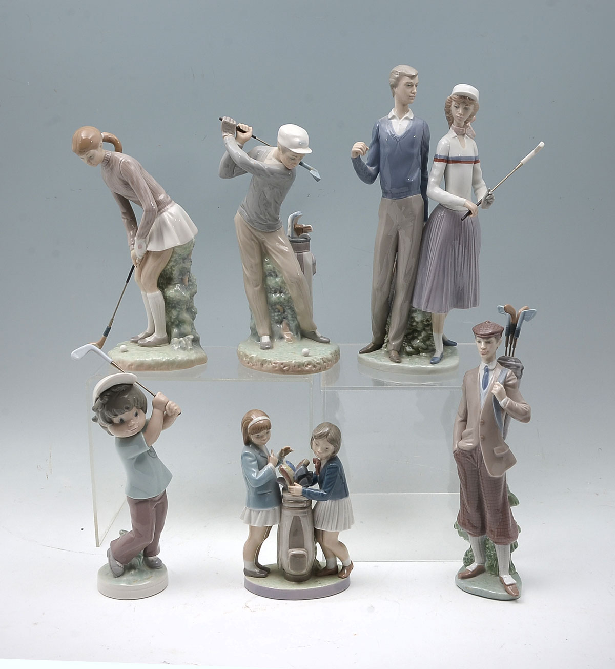 Appraisal: PC LLADRO GOLFING FIGURES ''Golfing Couple'' Male Golfer with Bag