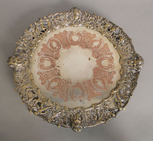 Appraisal: Silver plated tray with mask decorated rim h w