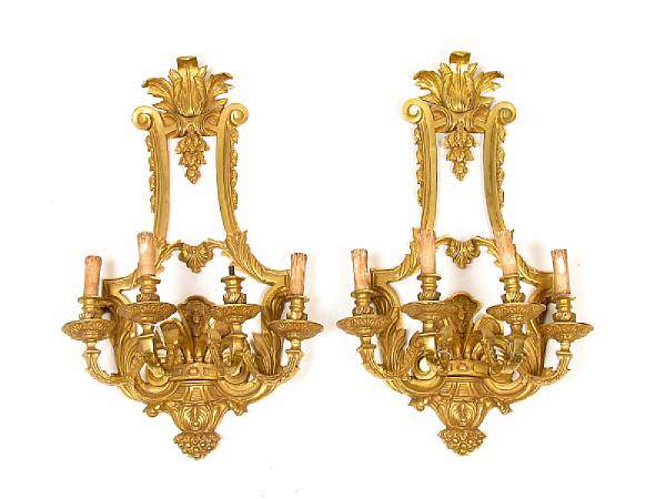 Appraisal: A pair of Regence style four light gilt bronze wall