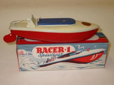 Appraisal: A Racer speedboat clockwork cream deck and red hull original