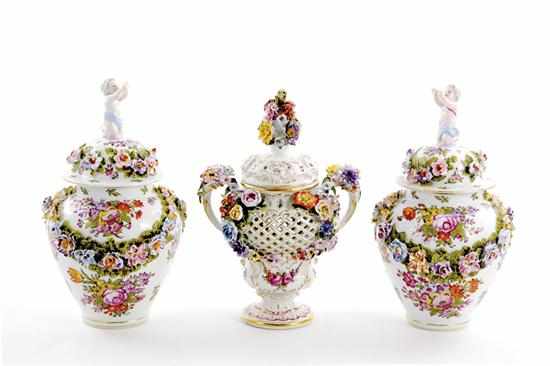 Appraisal: Meissen porcelain covered urns and keeper pair floral-encrusted diminutive urns