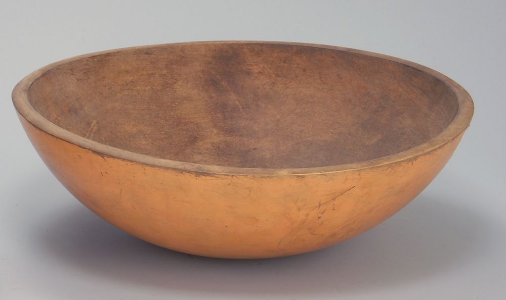 Appraisal: TURNED WOODEN SALAD BOWL th CenturyWith painted exterior in salmon-orange