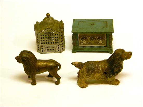 Appraisal: Four cast iron still banks Kenton Radio green standing lion