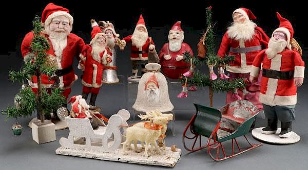 Appraisal: A COLLECTION OF NINE VINTAGE SANTA CLAUS S A COLLECTION