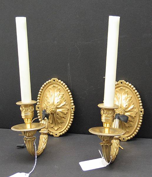 Appraisal: A pair of Louis XVI style gilt bronze single light