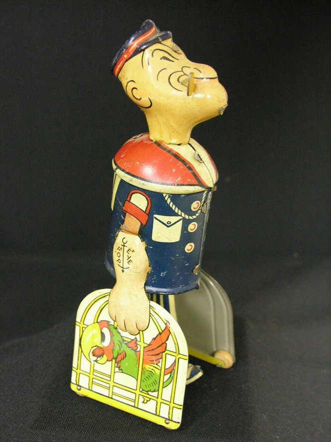 Appraisal: CHEIN POPEYE WITH PARROTS WINDUP WALKING TIN TOY Size Condition