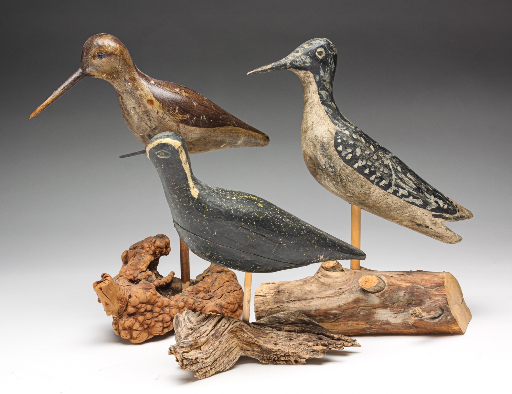 Appraisal: THREE AMERICAN SHOREBIRDS Late th century Carved wooden birds with