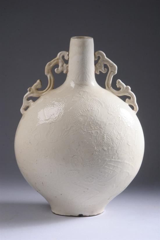 Appraisal: CHINESE CREAM PORCELAIN PILGRIM FLASK Circa th century Molded appliqu