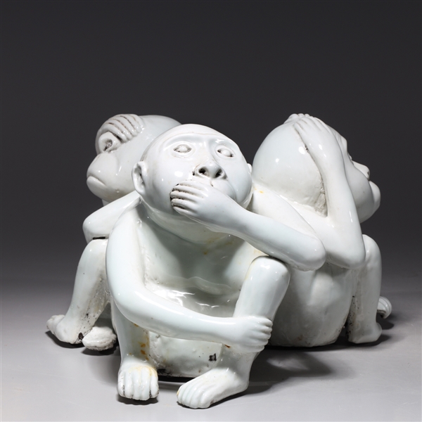 Appraisal: Chinese white glazed three monkeys porcelain statue some wear and