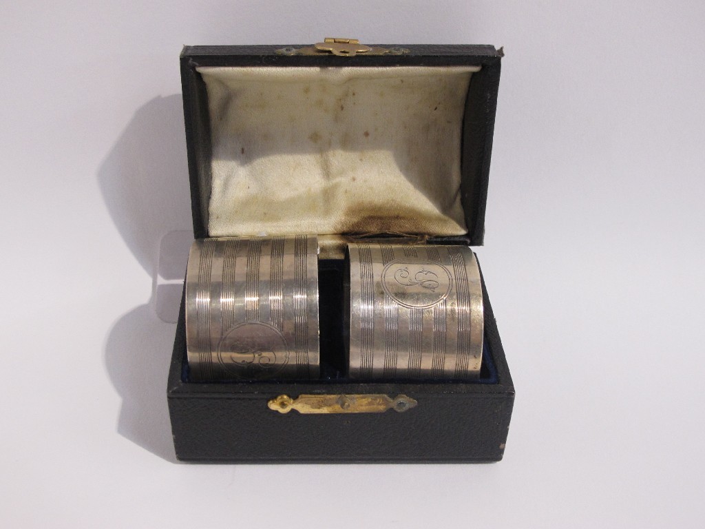 Appraisal: A cased pair of silver napkin rings Sheffield