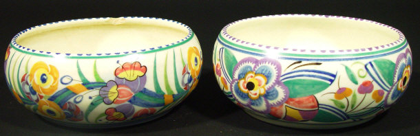 Appraisal: Two Poole Pottery bowls each hand painted with a continuous