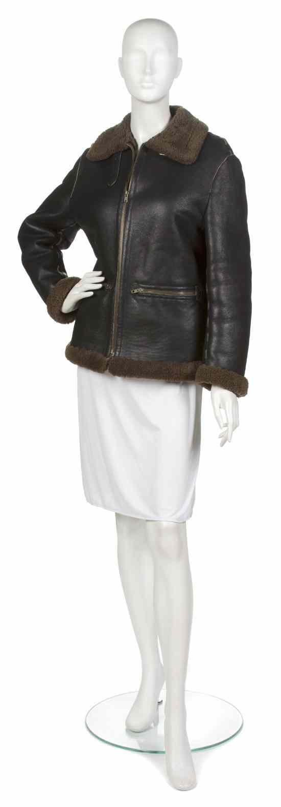 Appraisal: An Alaia Brown Leather Jacket lined and trimmed in brown