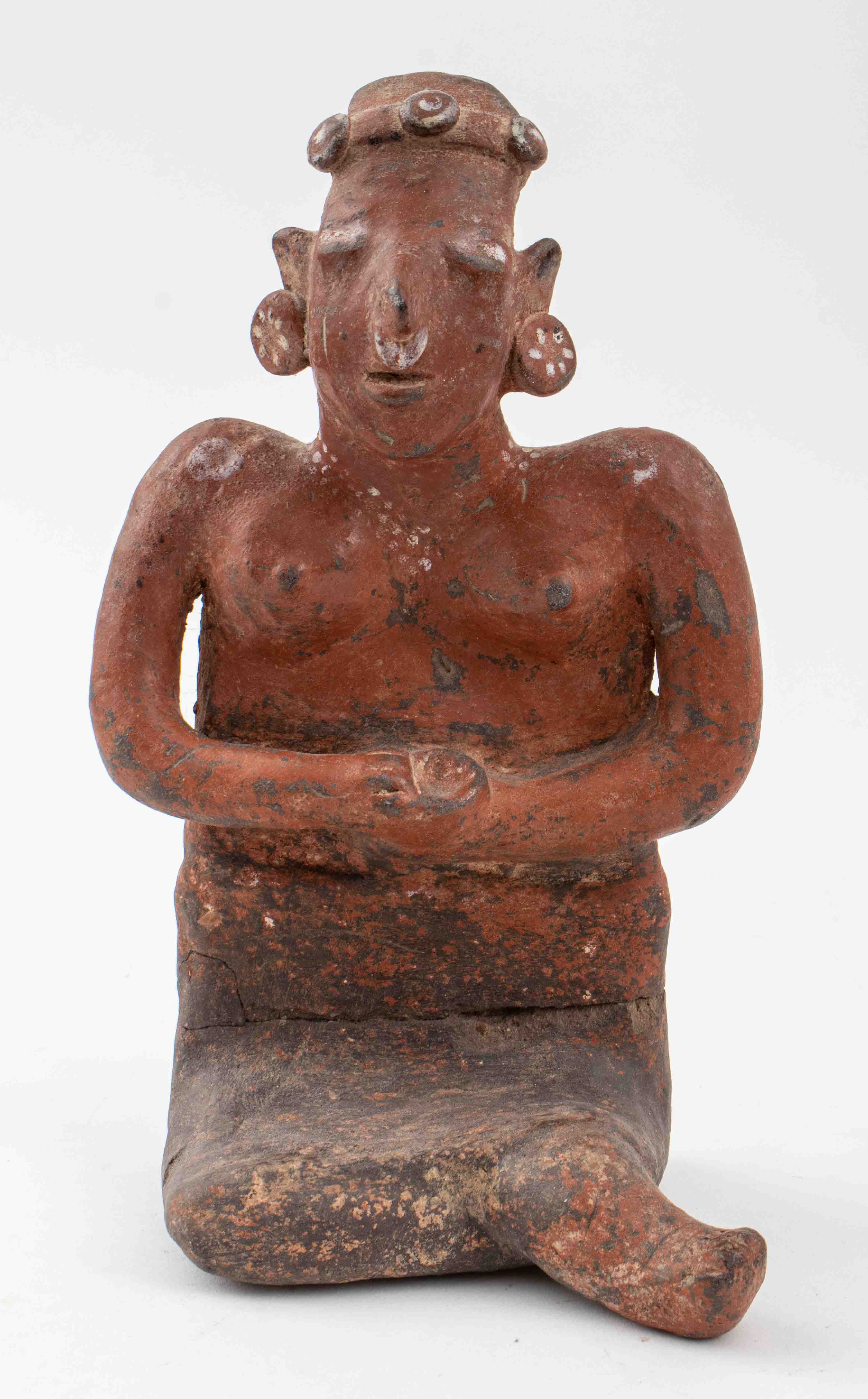 Appraisal: PRE-COLUMBIAN NAYARIT CERAMIC FEMALE FIGURINE Pre-Columbian Nayarit ceramic pottery seated