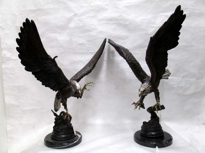 Appraisal: TWO POLYCHROME BRONZE WILDLIFE EAGLE SCULPTURES each eagle having silver