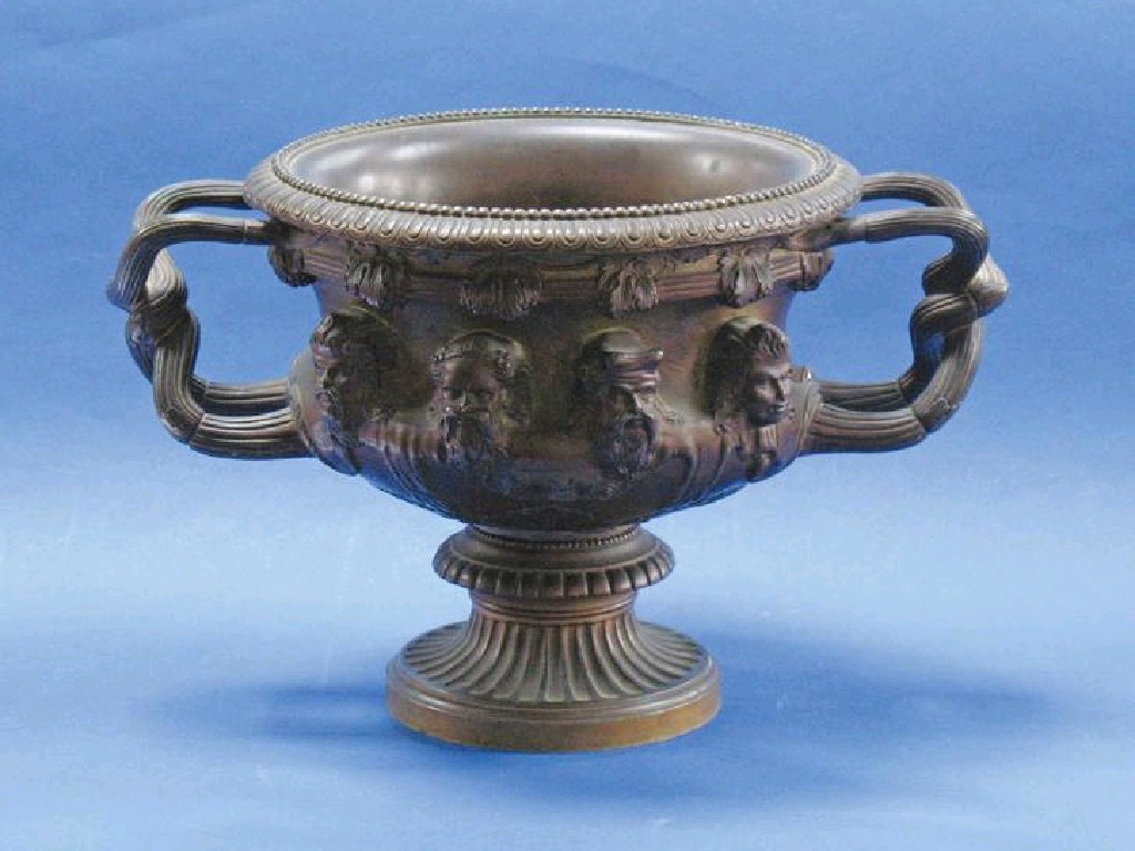 Appraisal: AFTER THE ANTIQUE A GILT AND BRONZED WARWICK VASE of