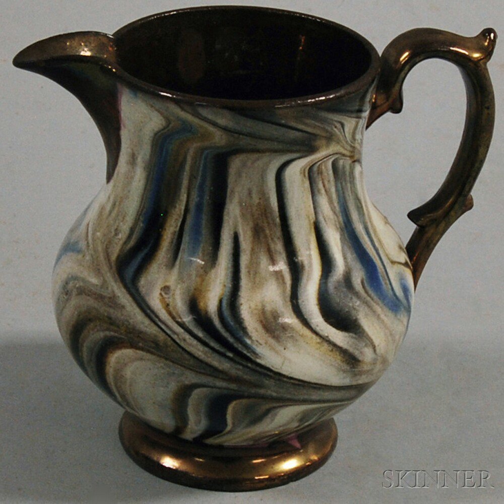 Appraisal: Agate-decorated Lustre Pitcher England th century the pitcher with copper