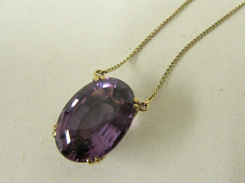 Appraisal: Large amethyst pendant in yellow metal mount and chain