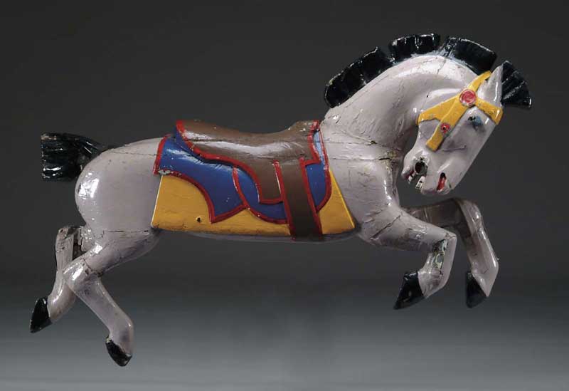 Appraisal: PAINTED AND CARVED WOOD CAROUSEL HORSE The repainted horse in