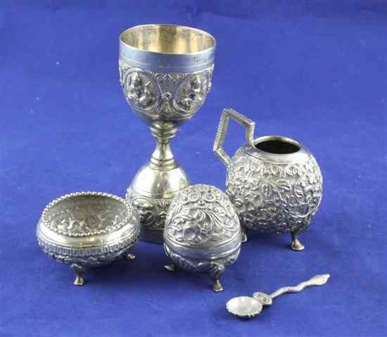 Appraisal: An Indian silver double ended spirit measure embossed with oval