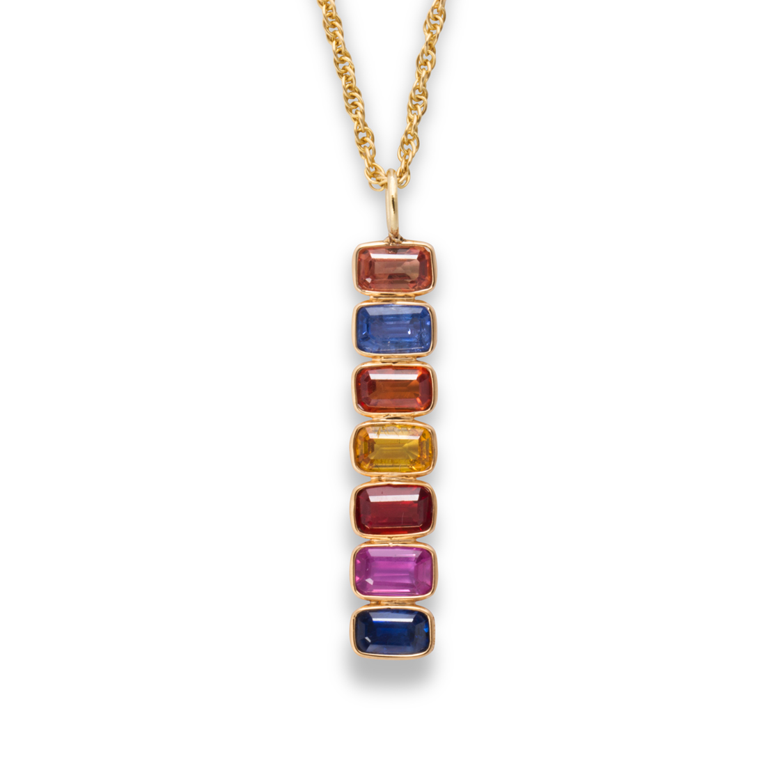 Appraisal: A FANCY COLORED SAPPHIRE AND GOLD PENDANT NECKLACE A fancy