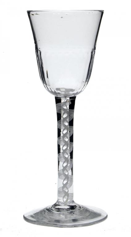 Appraisal: A WINE GLASS the fluted rounded funnel bowl on double