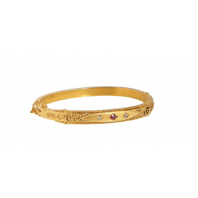 Appraisal: English K Yellow Gold Hinged Bangle Bracelet c the rope