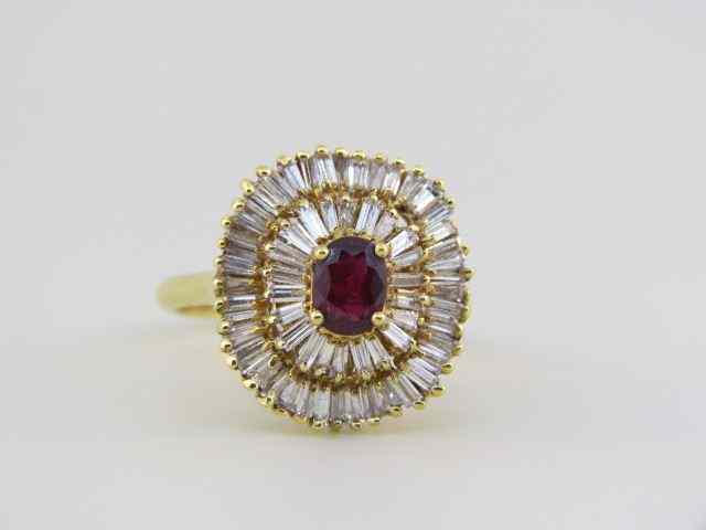 Appraisal: Ruby Diamond Ring carat oval gem surrounded by baguette cut