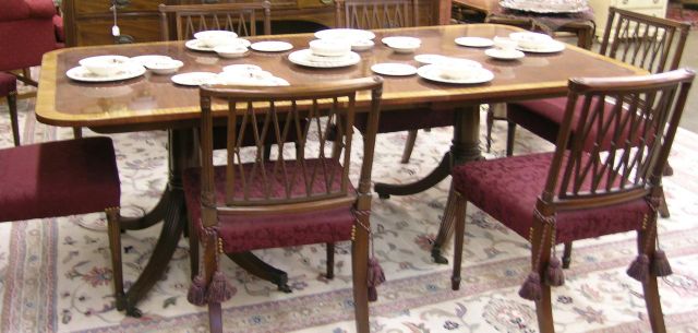 Appraisal: Baker Furniture banded mahogany dining table two leaves double pedestal