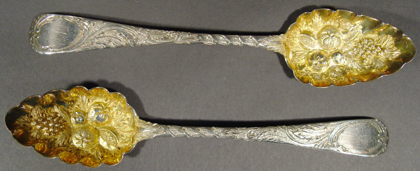 Appraisal: Pair of Georgian silver berry spoons with chased handles and