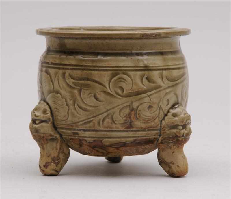 Appraisal: NORTHERN SUNG CELADON-GLAZED TRIPOD CENSER The squat bowl incised with