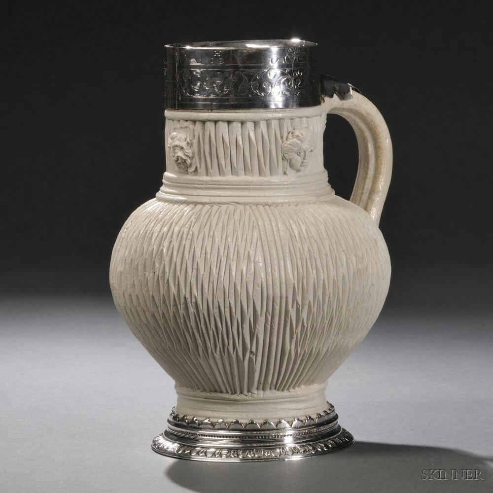 Appraisal: German Stoneware Silver-mounted Jug Seigburg th century baluster-form with vertical