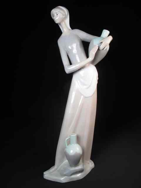 Appraisal: Lladro porcelain figurine ''Girl with jugs'' Painted and glazed Stamped