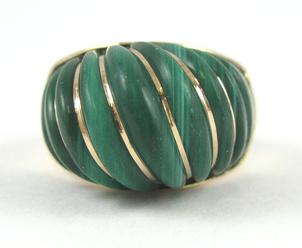 Appraisal: MALACHITE AND FOURTEEN KARAT GOLD RING with a ribbed malachite