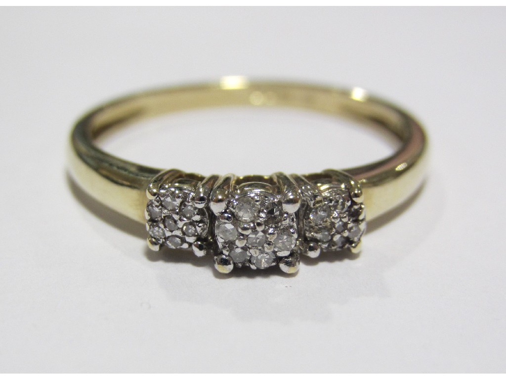 Appraisal: Nine carat gold triple diamond cluster ring